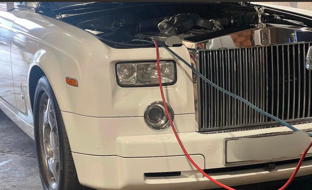 Premium vehicle connected to air conditioning regas hoses
